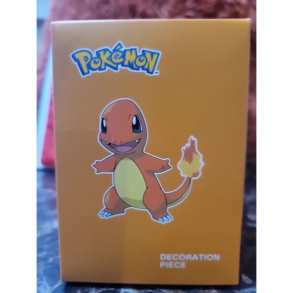 This item is a Pokémon Decoration Piece featuring the character Charmander.